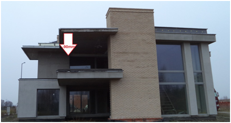 Przykład nienormowego ugięcia stropu – balkonu. Zjawisko spowodowane niewłaściwym wykonaniem zbrojenia, użyciem betonu o zaniżonej klasie wytrzymałości, brakiem odpowiedniej pielęgnacji świeżego betonu w warunkach zimowych